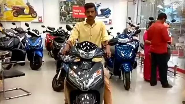 man buys scooter with sack full of savings in coins